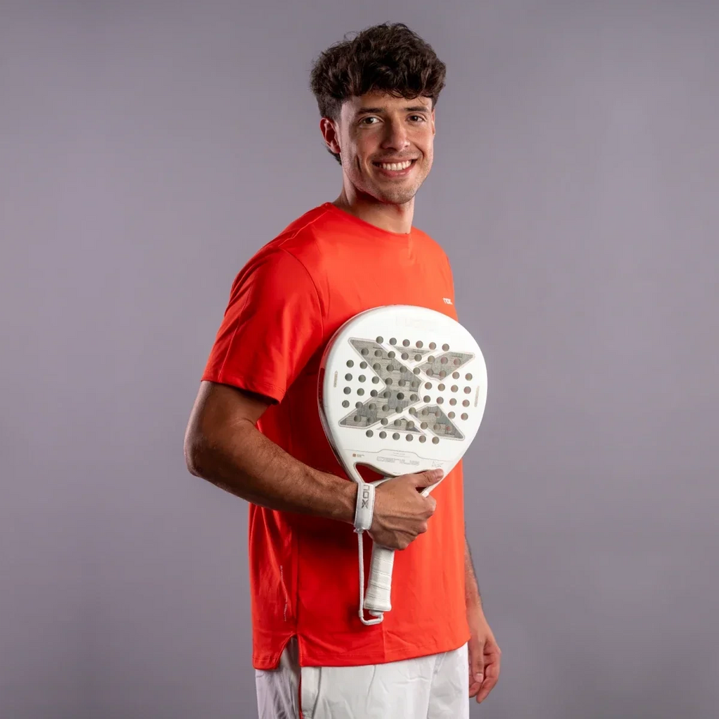 Nox Genius 12K Alum XTREM Lite 2027 by Agustín Tapia padel racket, player holding the racket