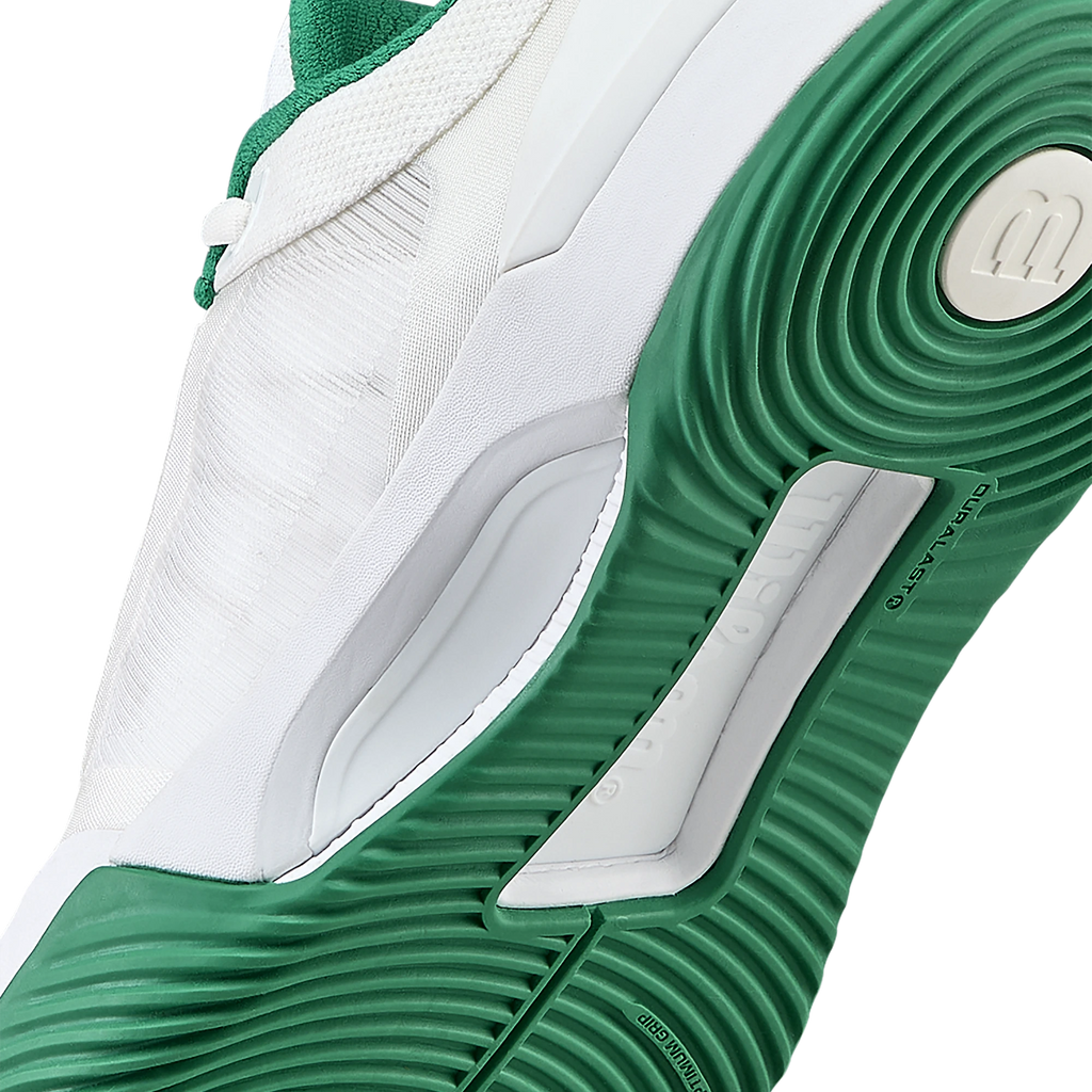 Wilson Intrigue Tour Women's Padel Shoes — White / Bosphorus; Close-up of an obliquely presented outsole, midfoot insert and adjoining white upper; toe and heel are cropped.