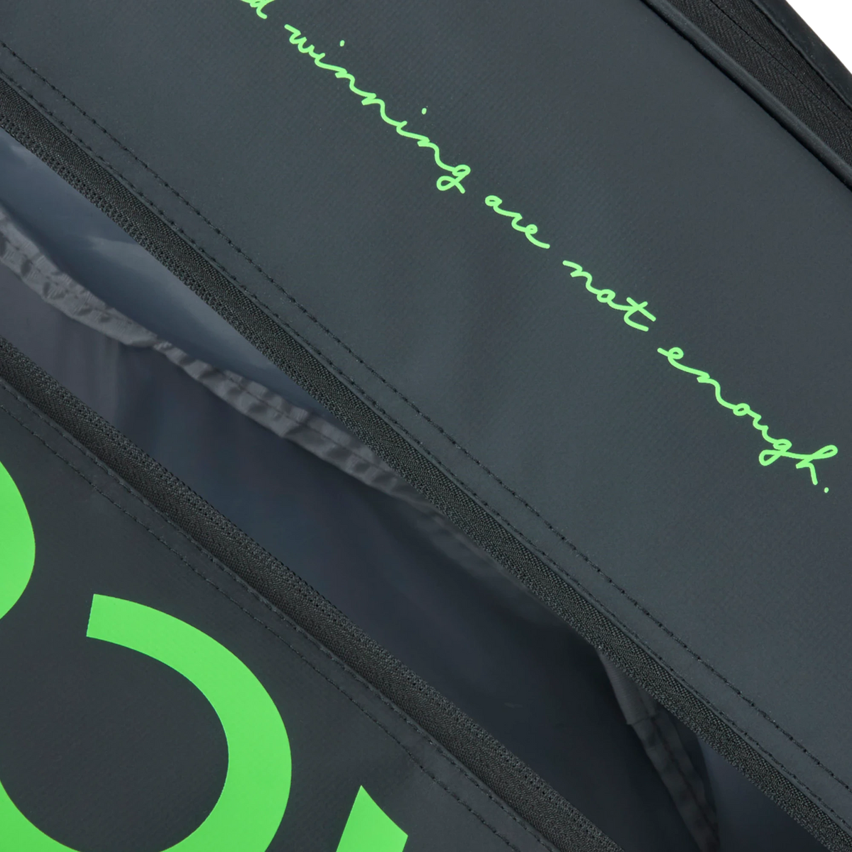 Lacoste L-Paletero black and green padel bag, zipper and top-panel detail