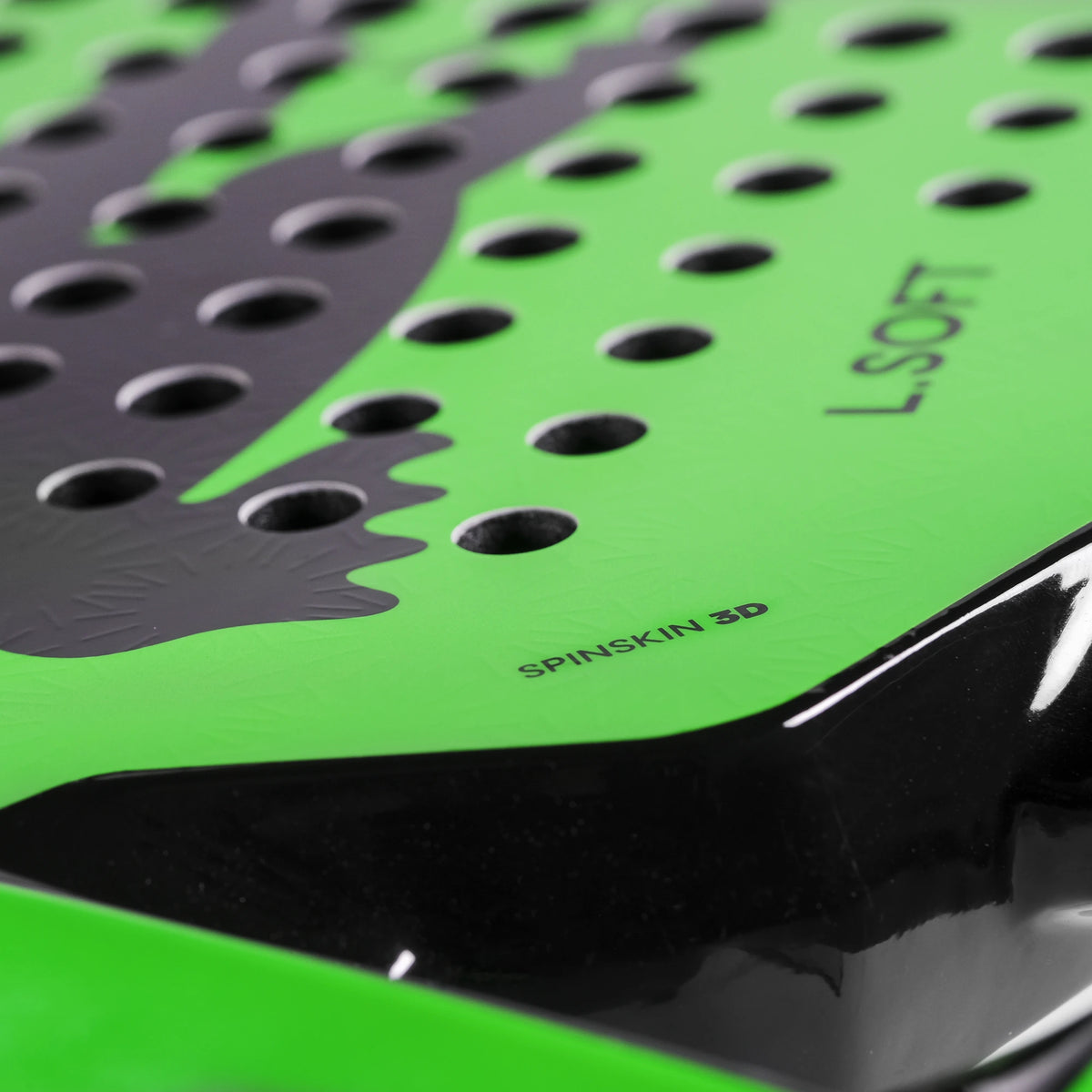 Lacoste L-Soft green and black padel racket, frame and face detail