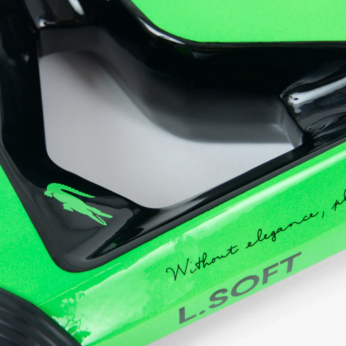 Lacoste L-Soft green and black padel racket, throat detail